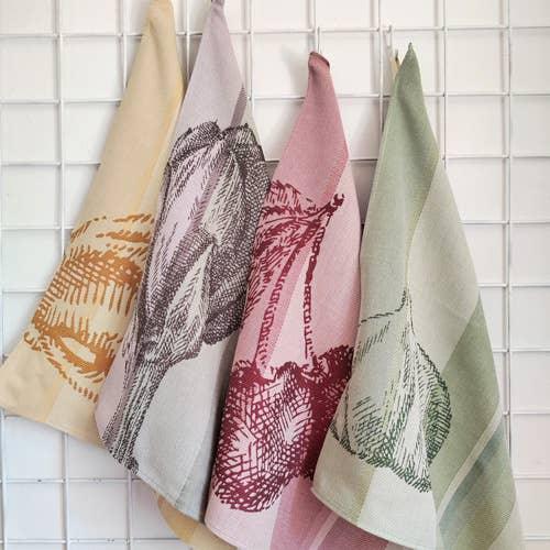 Ekotex linen tea towels with botanical prints in beige, taupe, red, and green