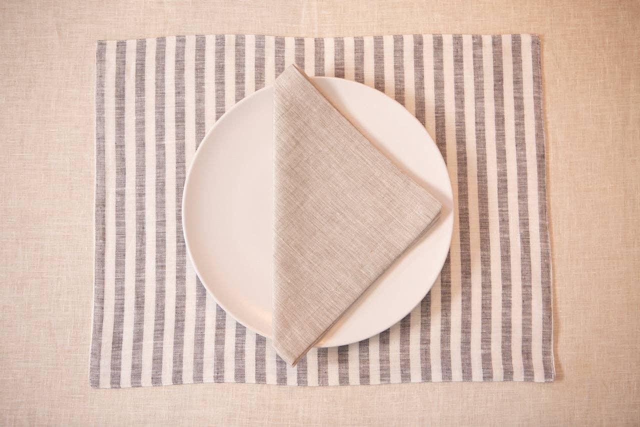 Fog Linen Work striped linen placemat with neutral linen napkin and white plate