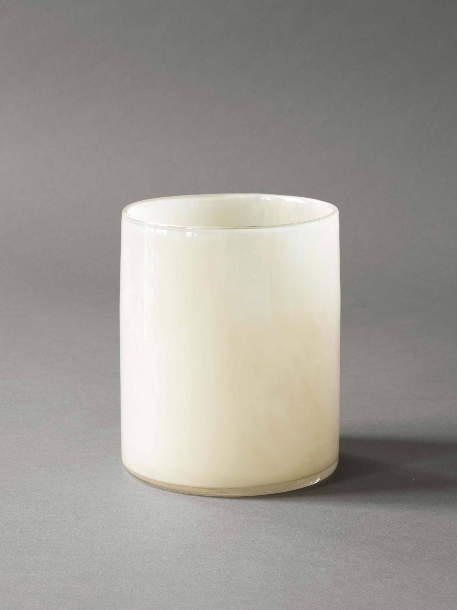 LAFCO white glass candle vessel with smooth finish on grey background