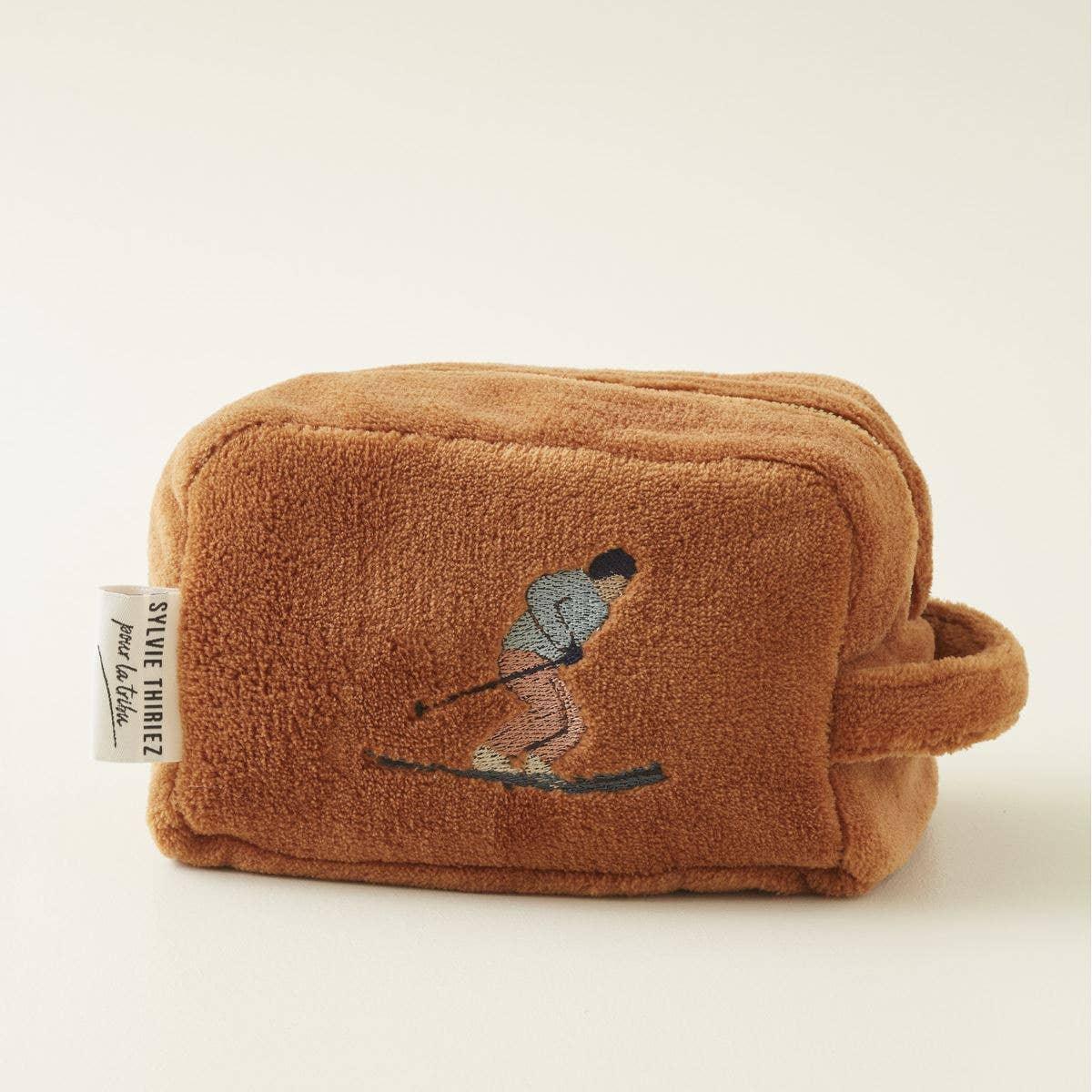 Sylvie Thiriez brown terry cloth toiletry bag with skier embroidery