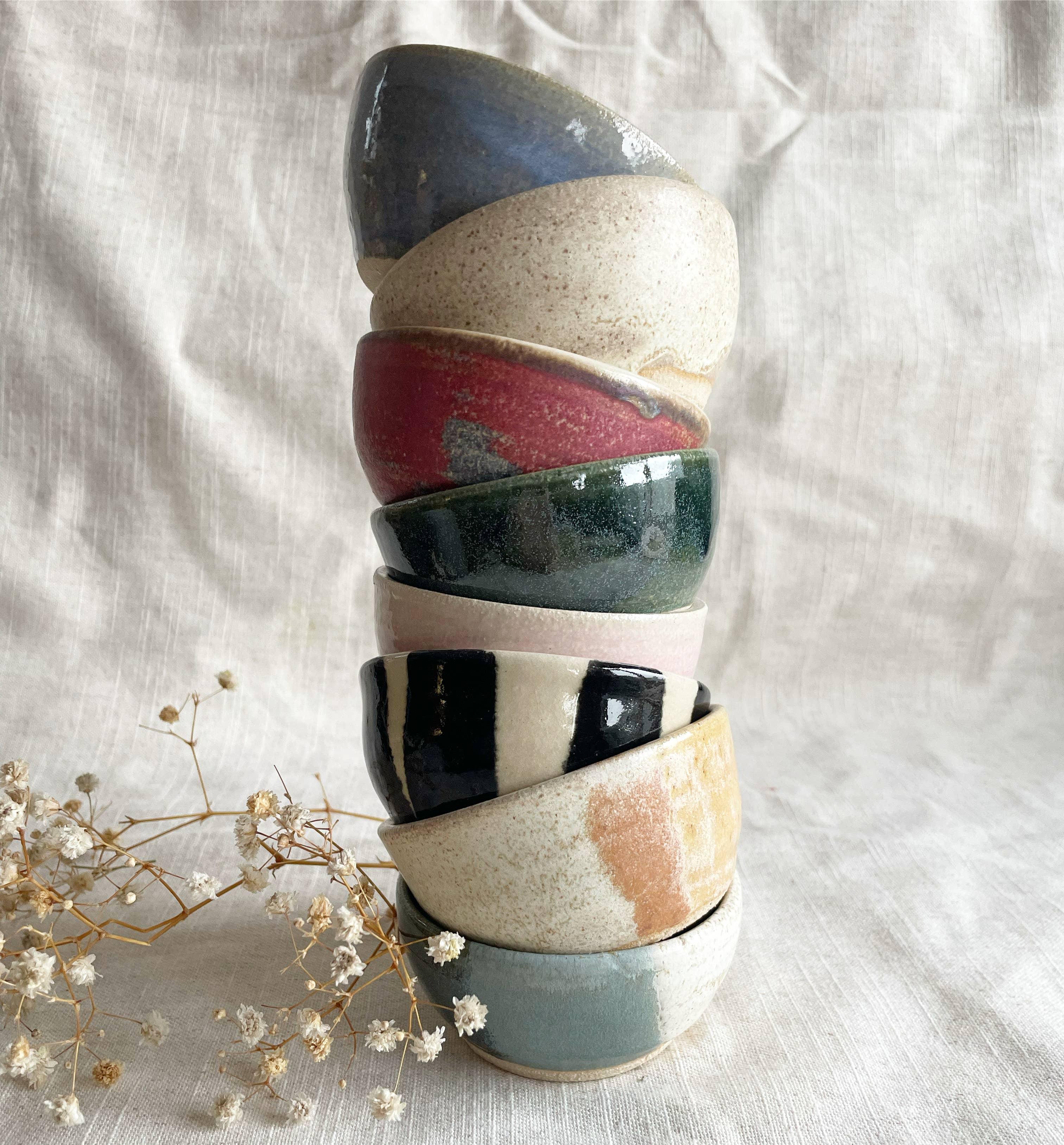 Kosa Artisan ceramic bowls stack, hand-glazed stoneware in assorted colors, minimalist style