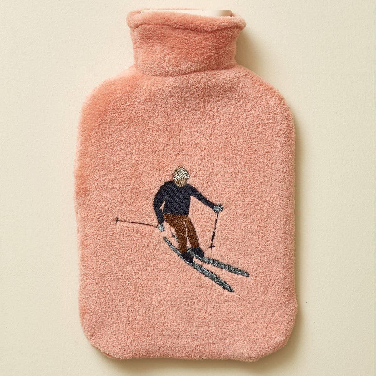 Yawn pink fleece hot water bottle with embroidered skier design