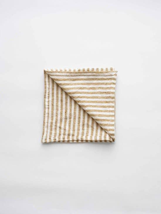 Mungo cotton striped beige and white dishcloth folded on white background