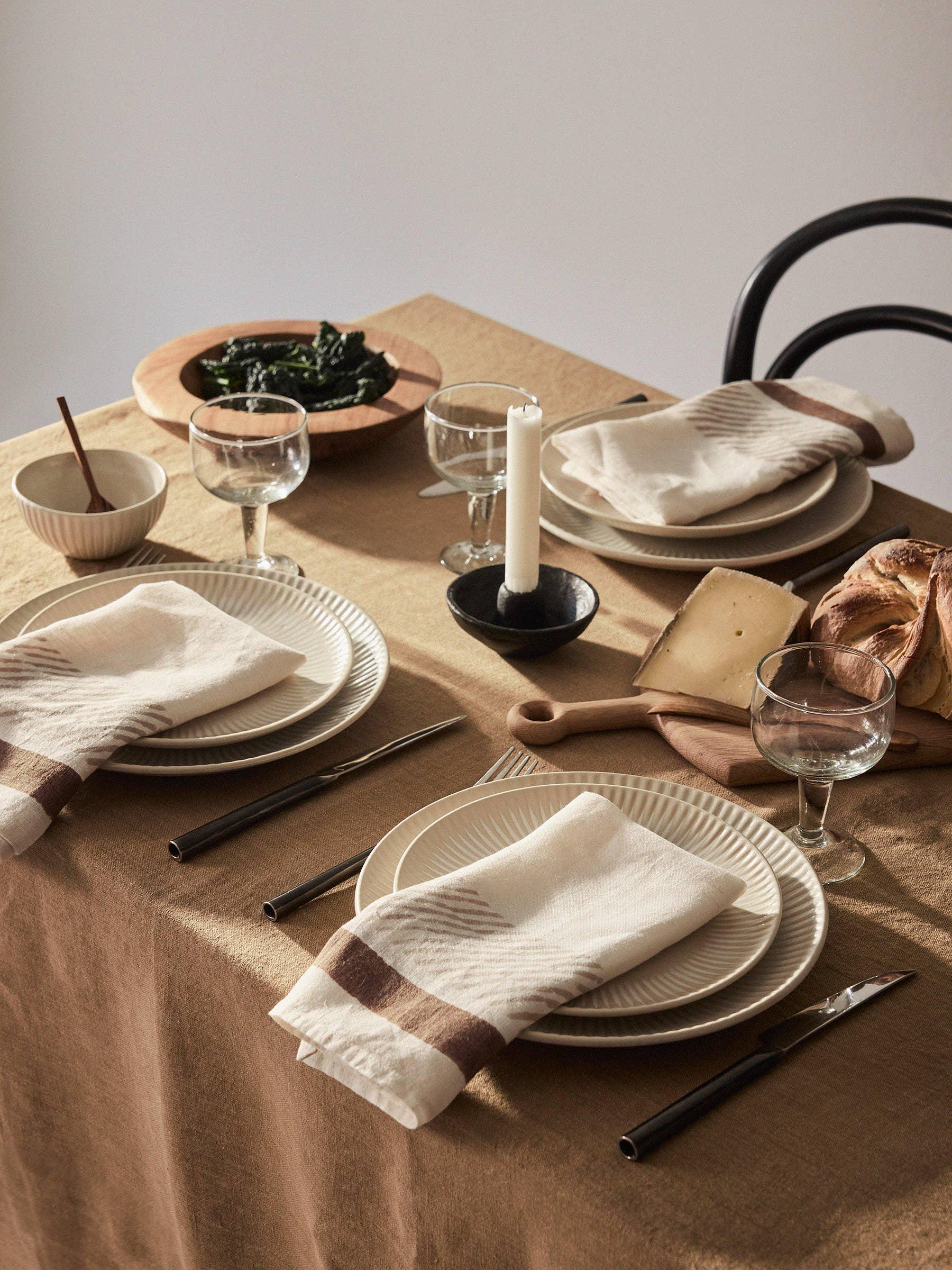 Fog Linen Work linen napkins and tablecloth in beige on an elegant table setting