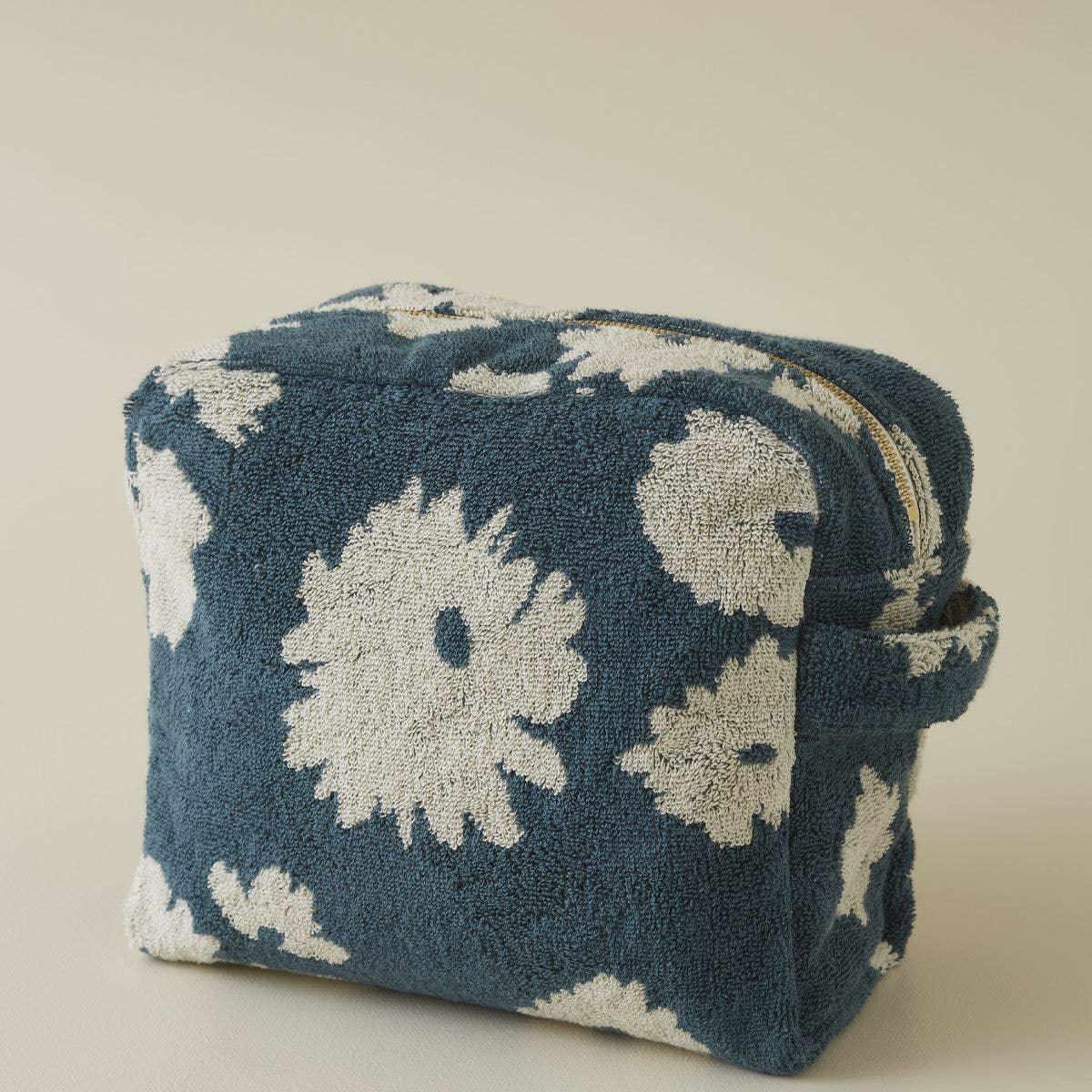 BAGGU terry cloth cosmetic bag in blue and white floral pattern