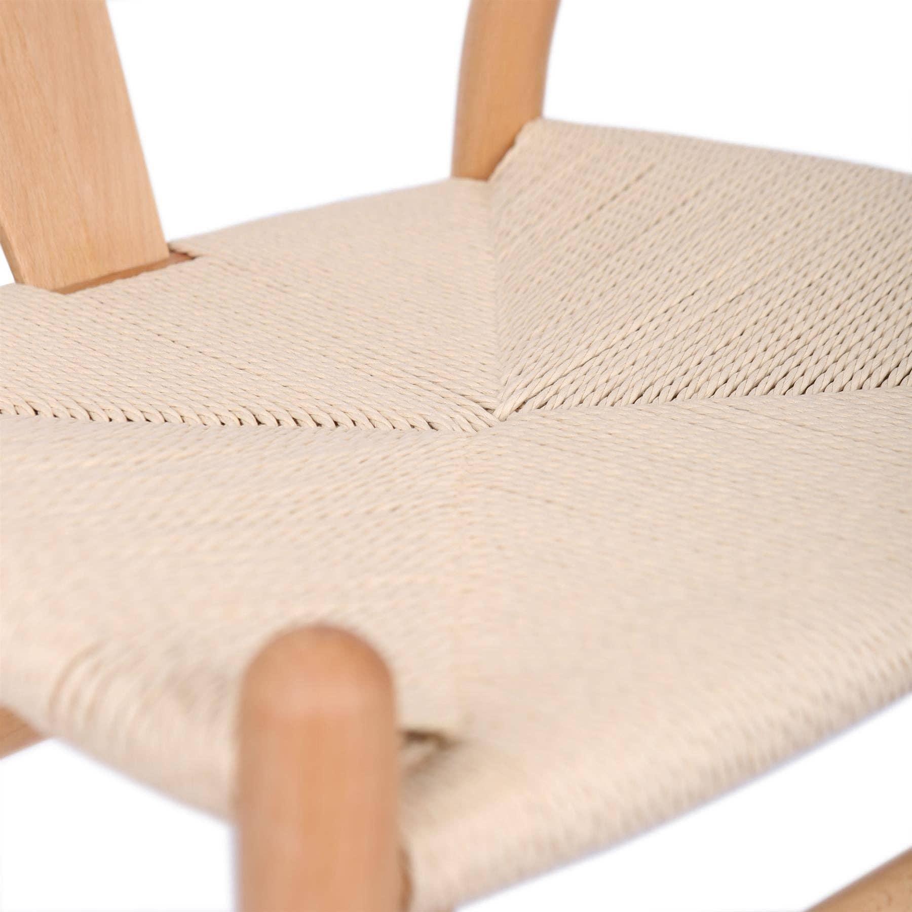 Moodel Wishbone chair close-up, natural wood frame with beige woven paper cord seat