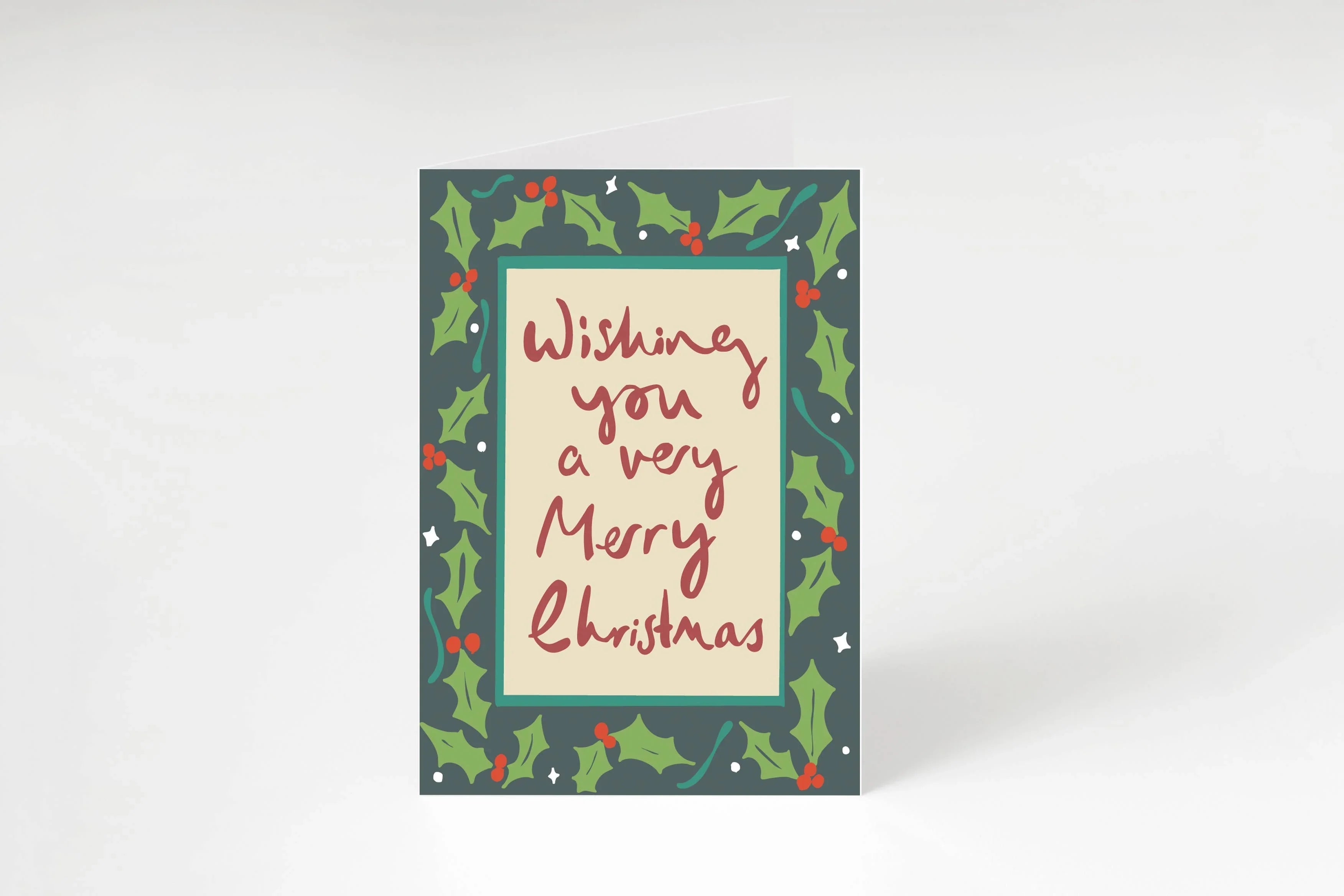 Green Gutted Christmas card with holly design, premium paper, dark green and cream colours.