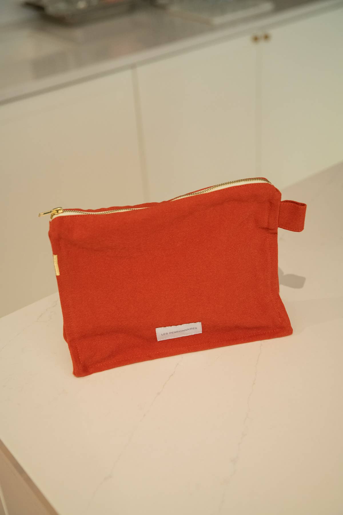 Les Pensionnaires Toiletry Bag in Flamboyant Orange
