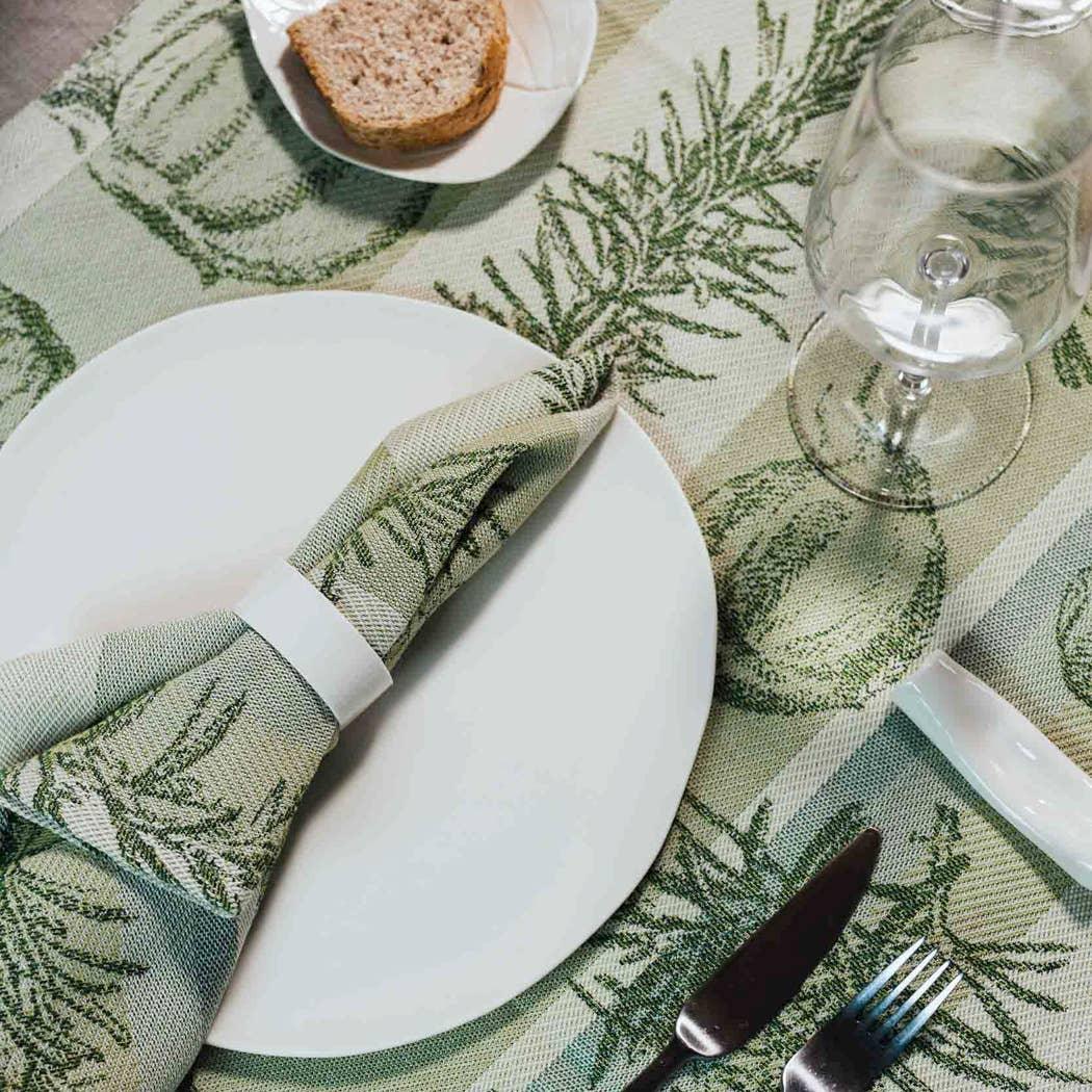Tessitura Toscana Telerie green cotton linen placemat and napkin with botanical print on elegant table setting