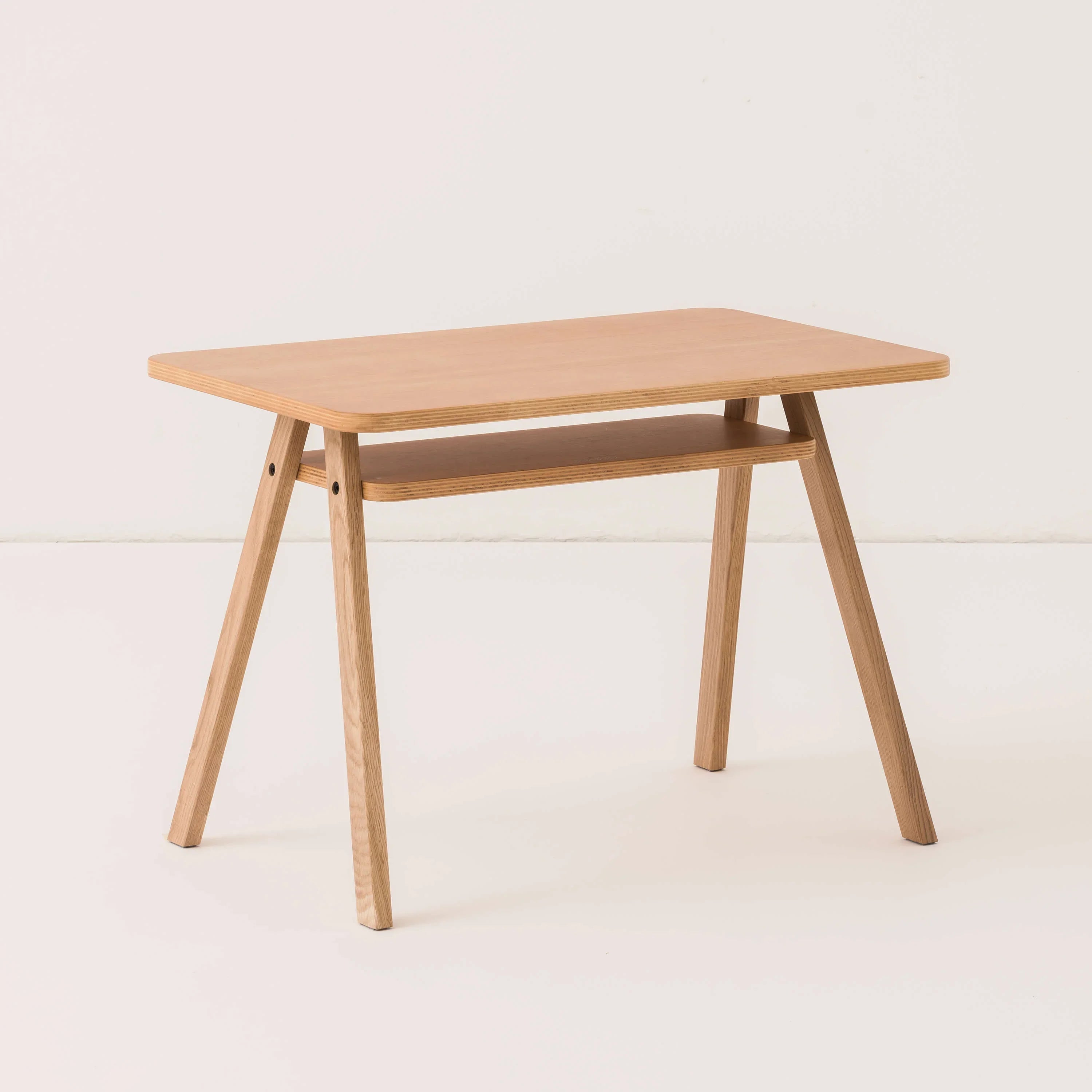 Nobodinoz Growing Green kids table in natural oak wood with minimalist design