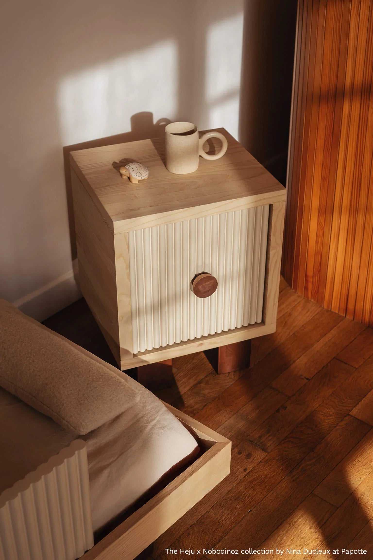Heju x Nobodinoz bedside table in light wood and cream, premium bedroom furniture