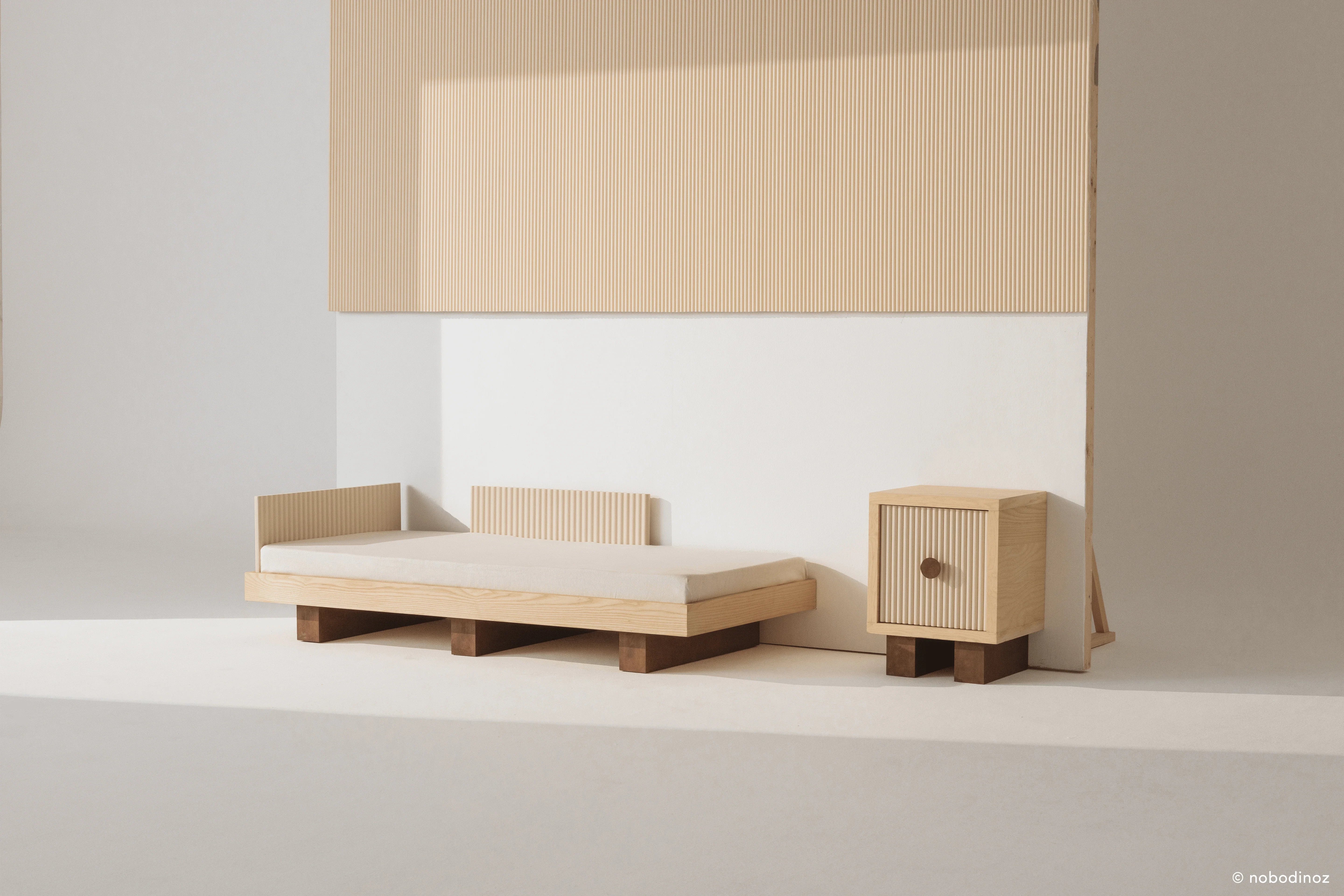 Heju x Nobodinoz junior bed and nightstand in light wood with minimalist beige details