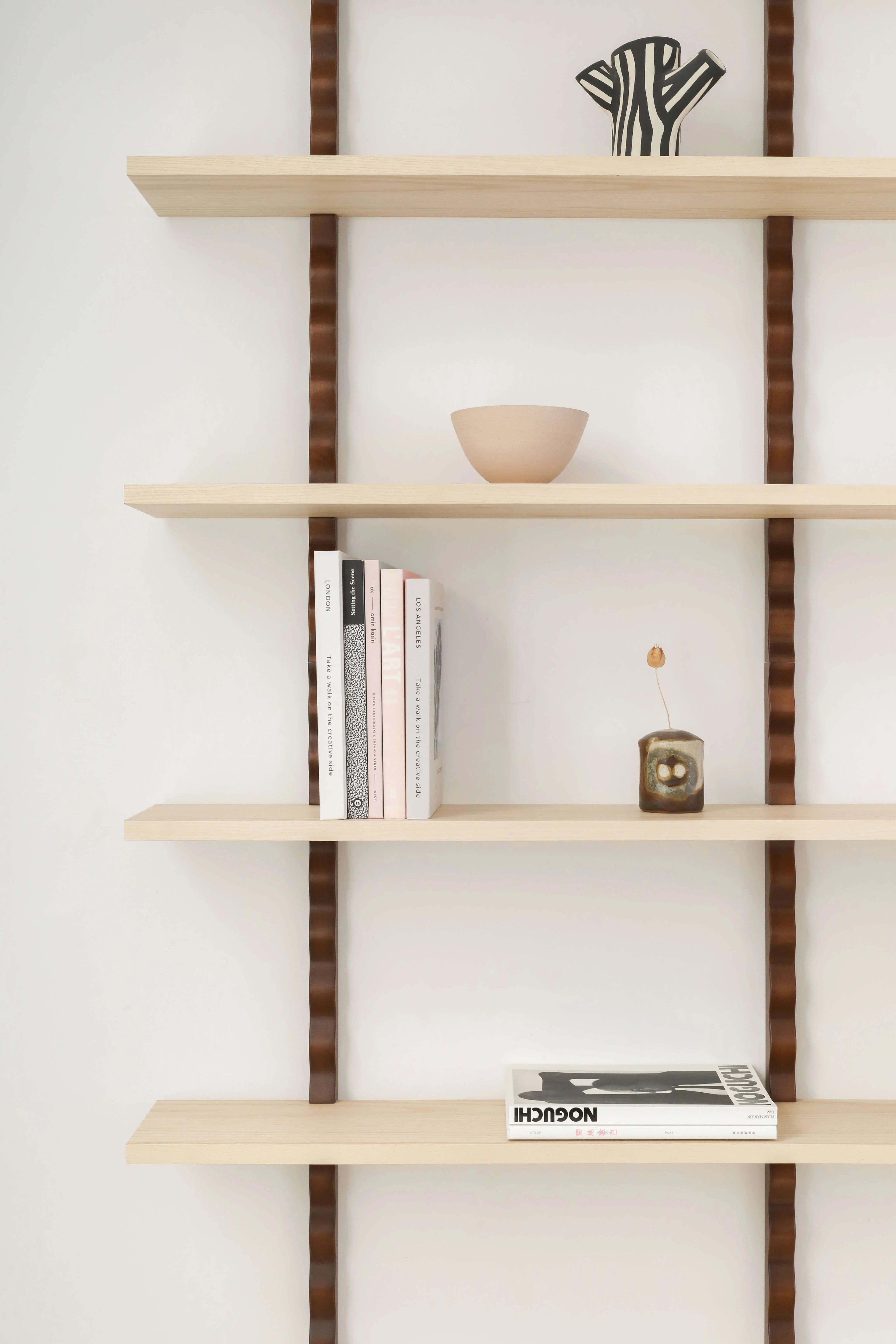 Heju x Nobodinoz premium wood wall shelves with wavy brown supports, minimal decor, light finish