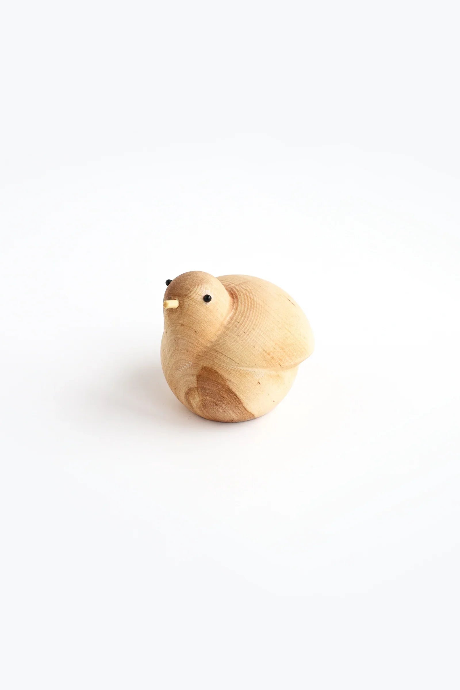 PICC wooden bird figurine, natural wood decor with smooth light brown finish on white background