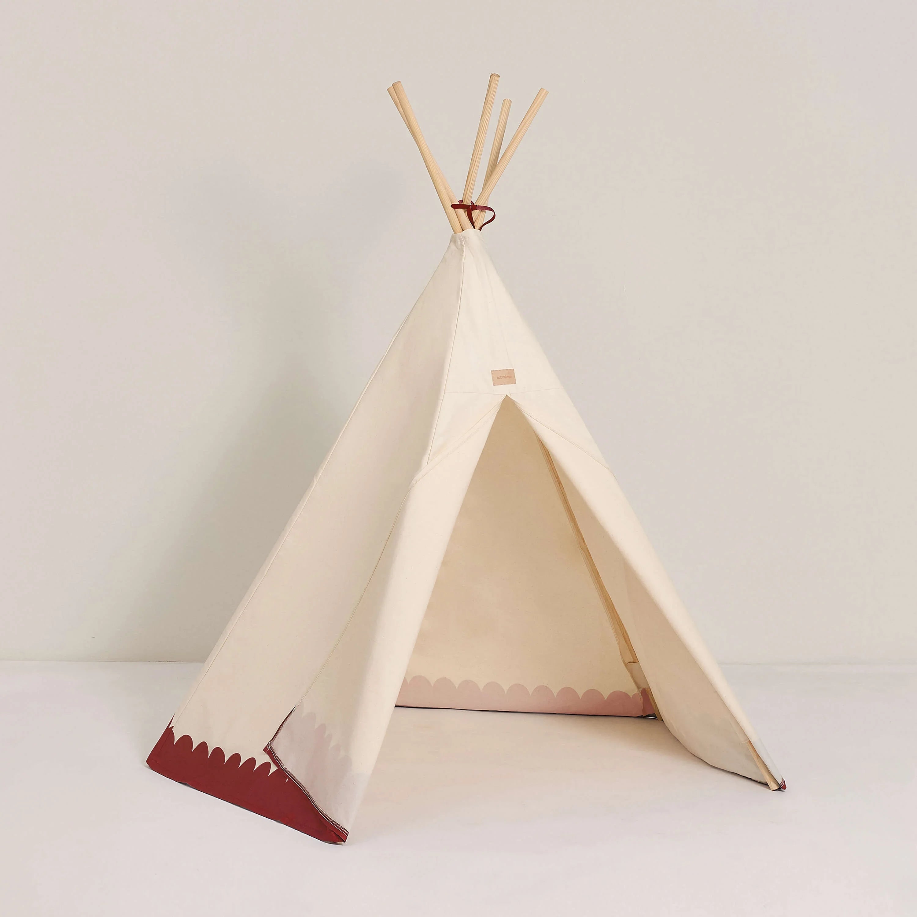Nobodinoz Arizona teepee, cream cotton fabric with carmine detail and wooden poles