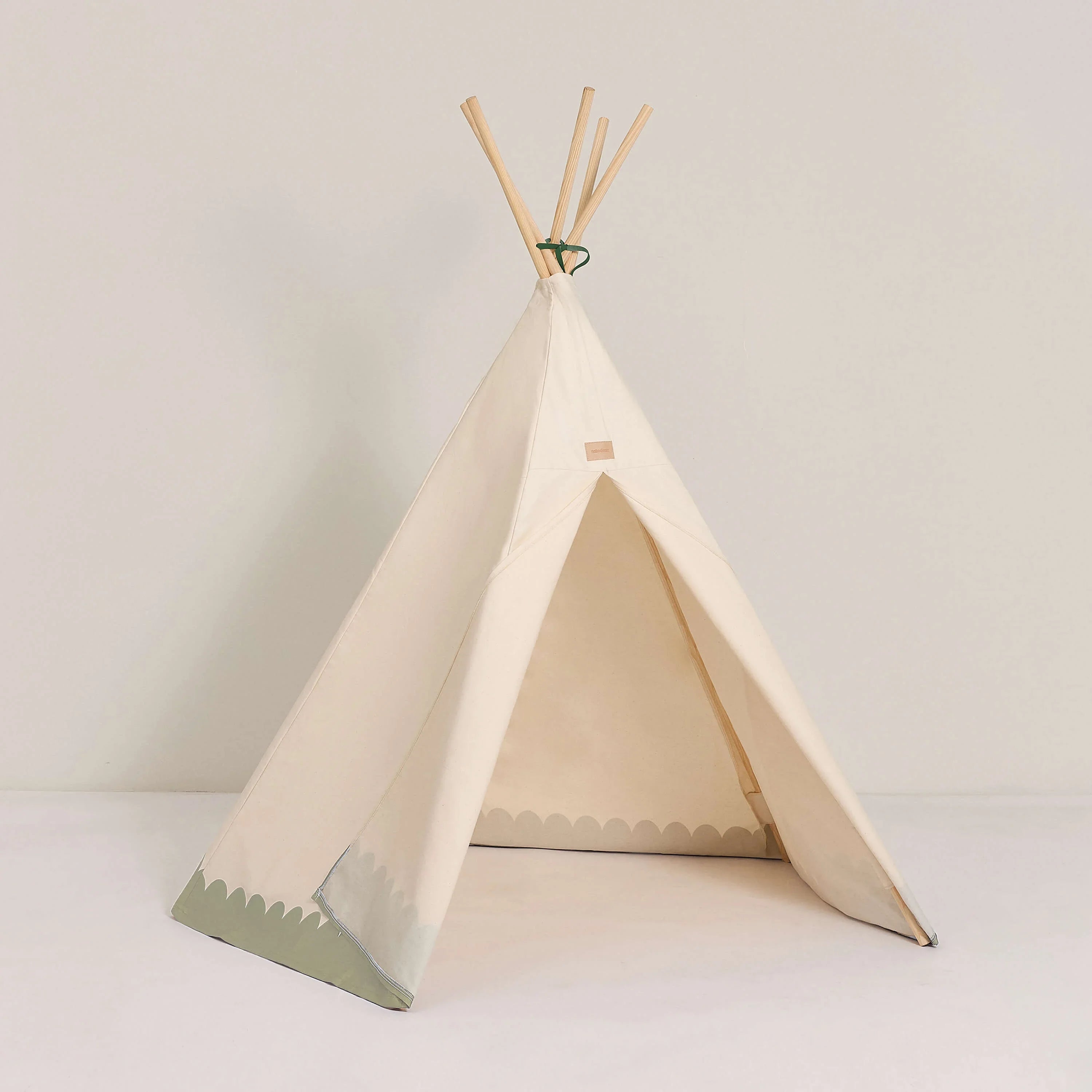 Nobodinoz Arizona teepee tent, organic cotton, wood poles, cream with green details