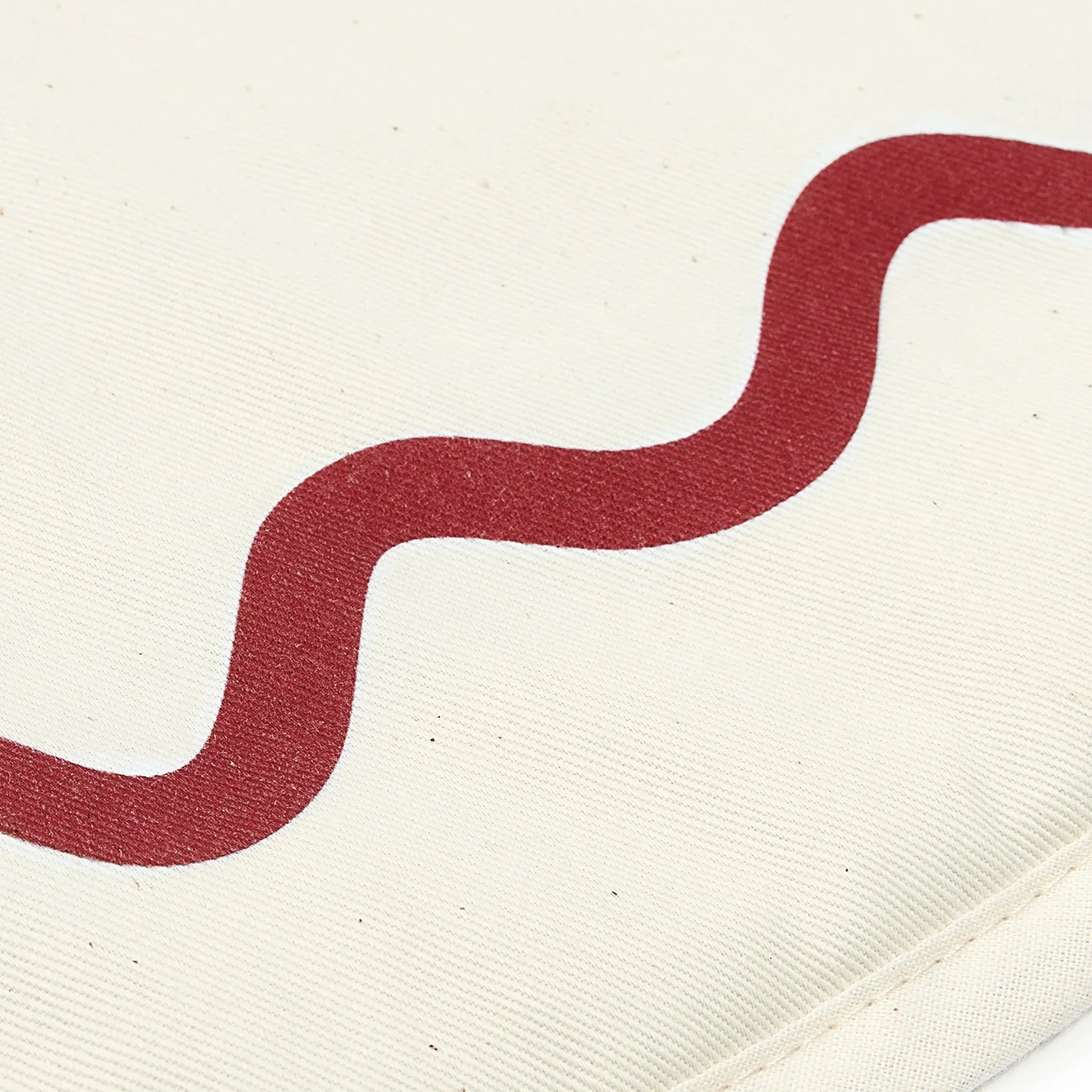 Nobodinoz Vibes playmat, organic cotton, carmine red wavy line on cream background
