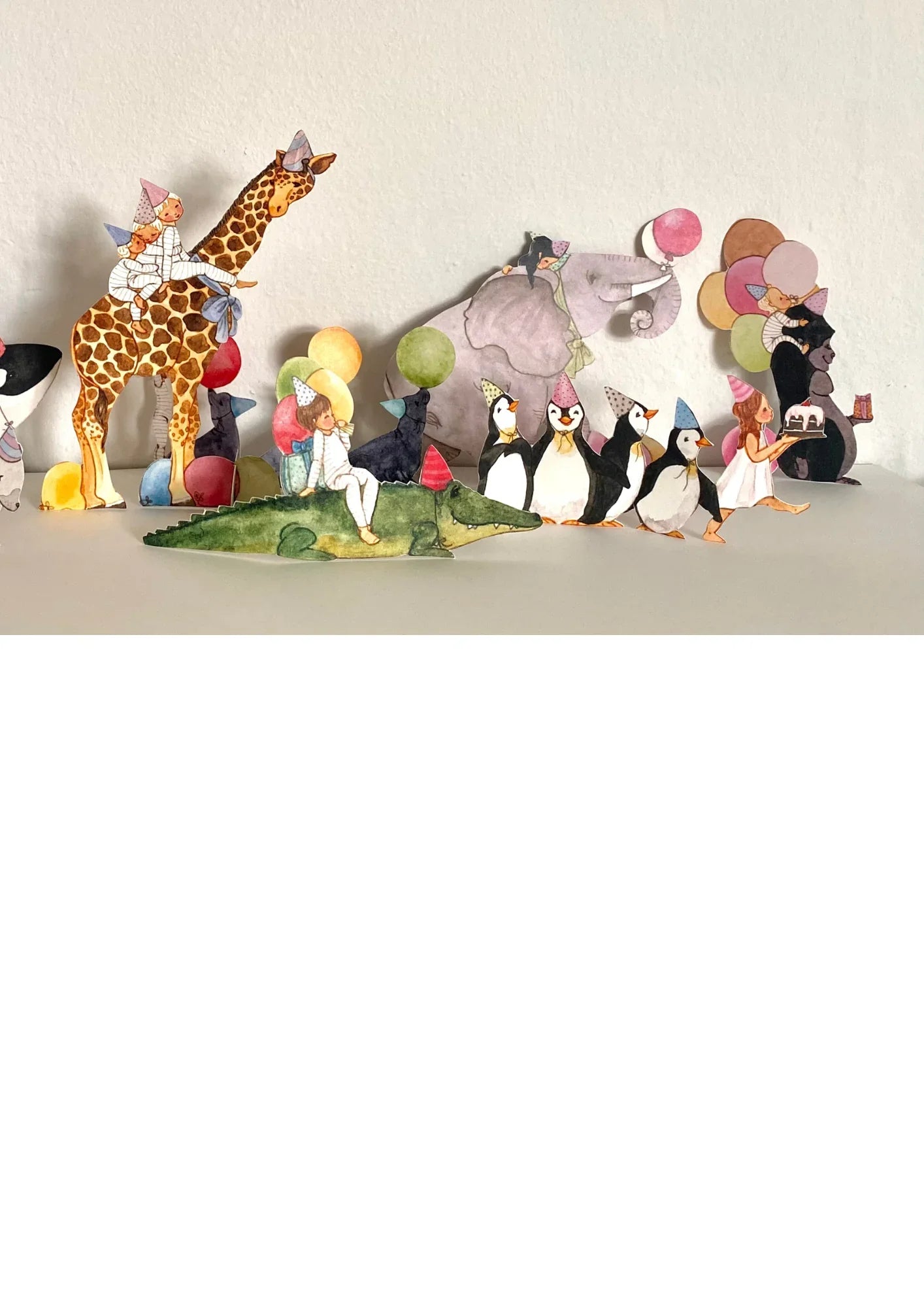 FableWood paper animal party decorations with watercolor animals, balloons, and children