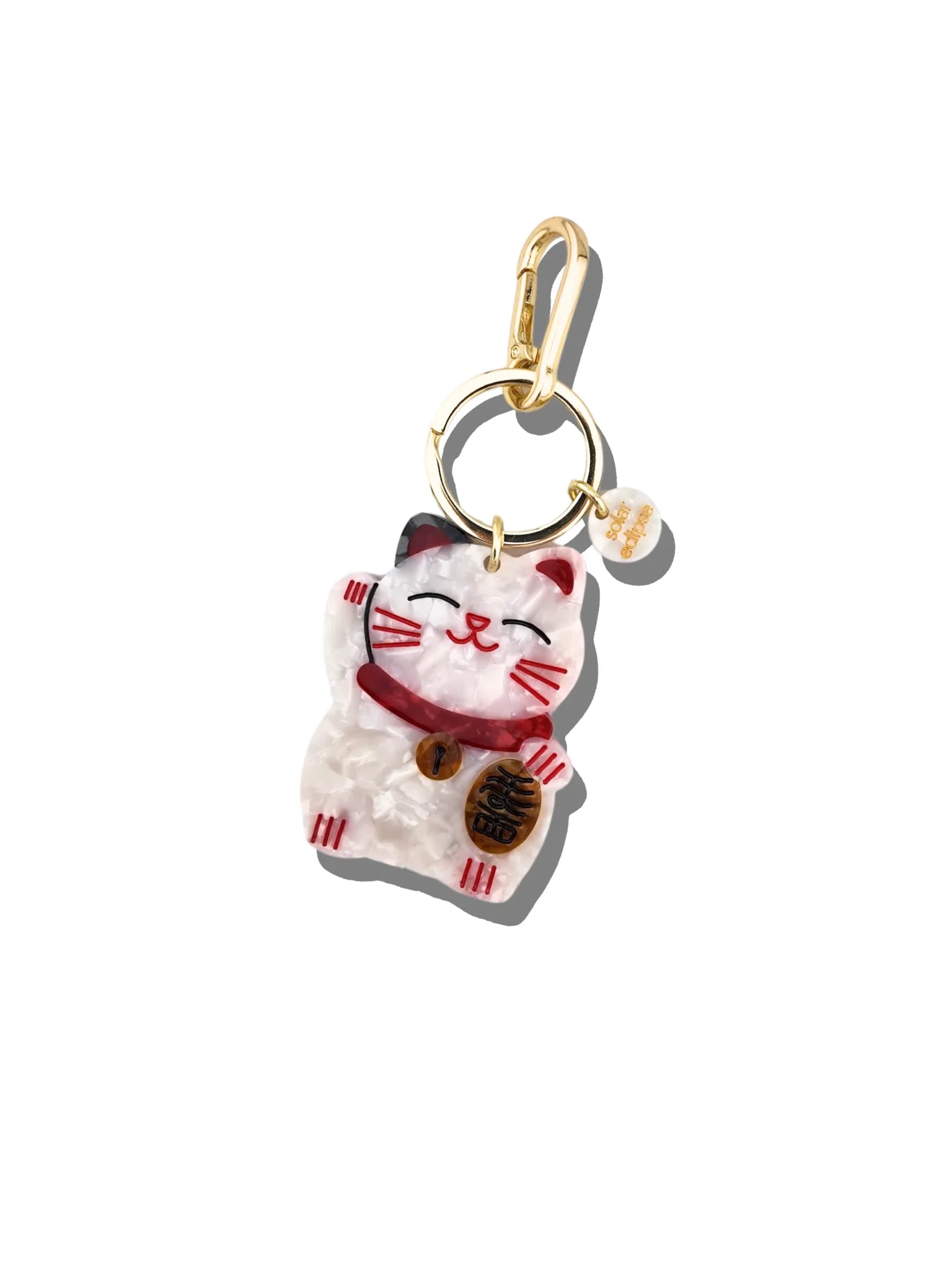 Coucou Suzette lucky cat keychain, pearl acrylic, gold hardware, white and red accents