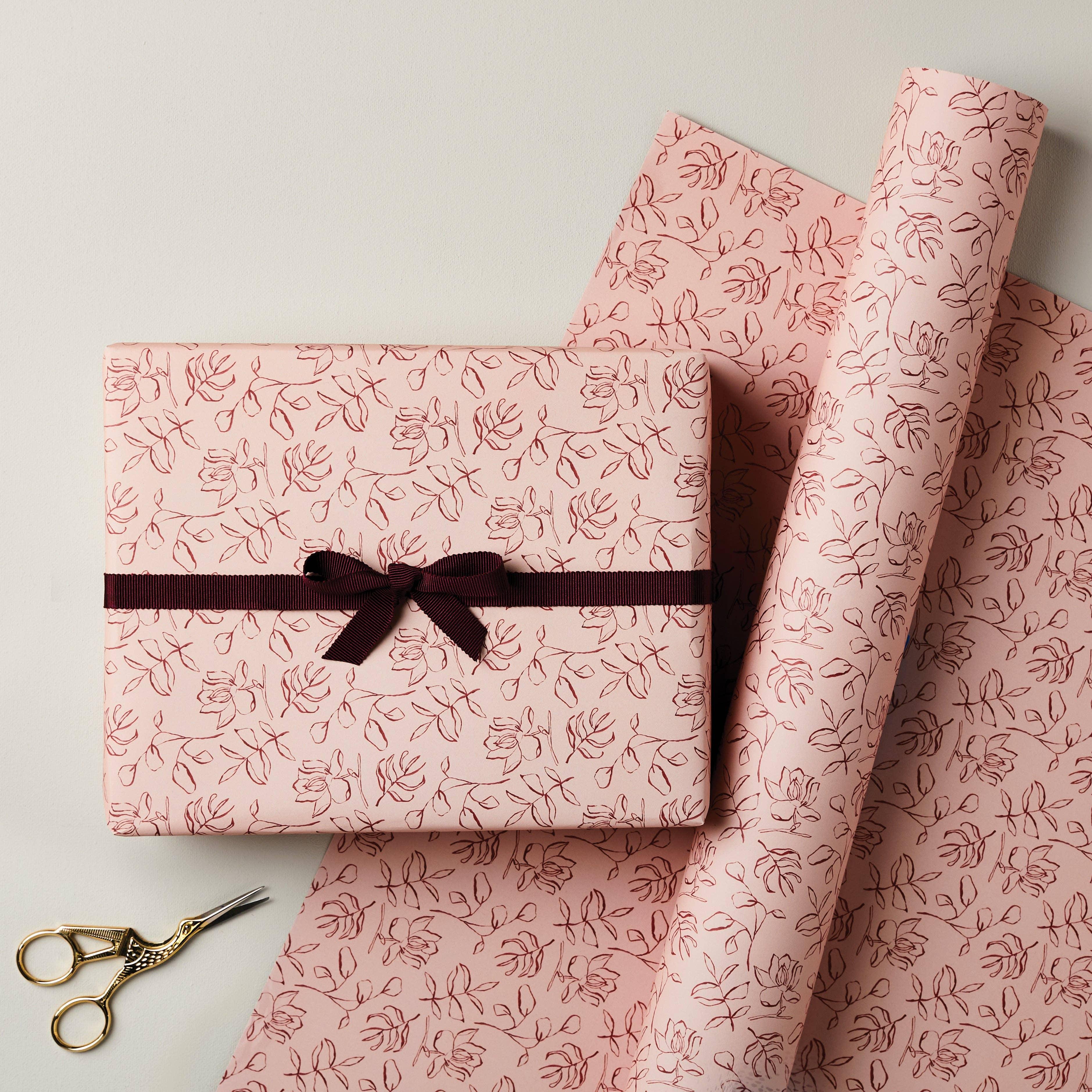 Rifle Paper Co. pink floral wrapping paper, luxury ribbon, gold scissors, premium gift wrap