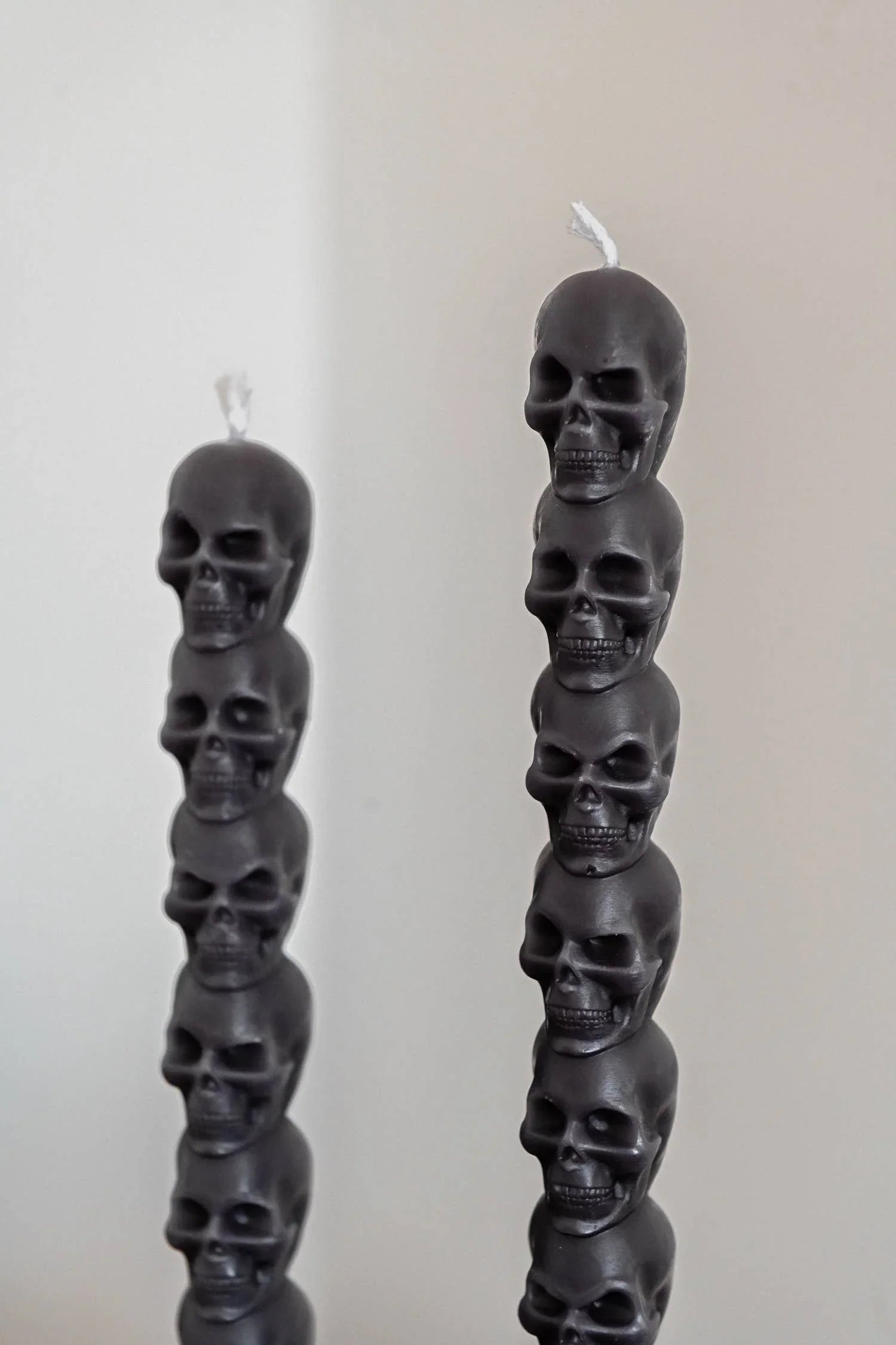 Macabre Decor black wax skull taper candles, stacked skull design, premium gothic home accessory