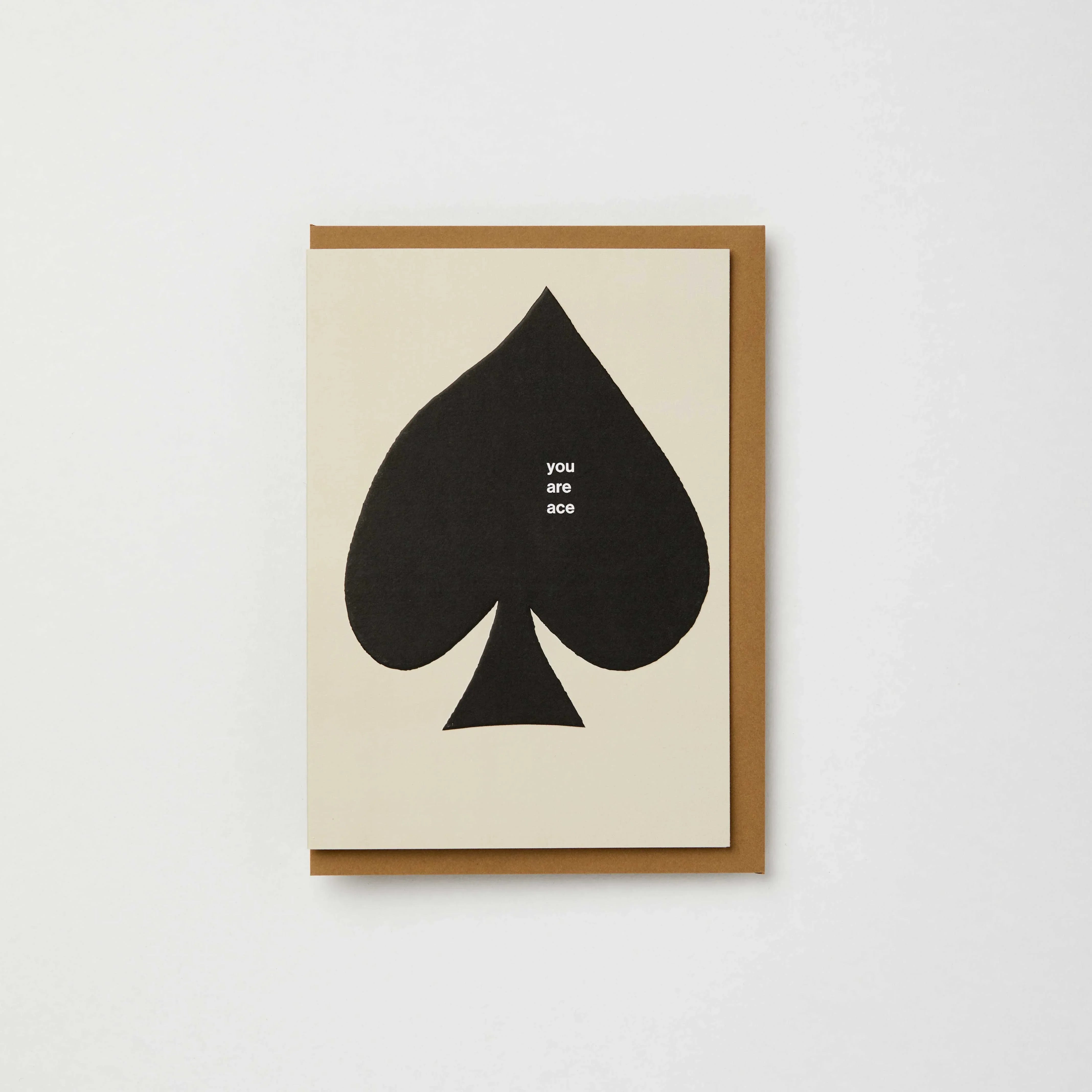 wrap magazine ace of spades greeting card cream card stock with brown envelope