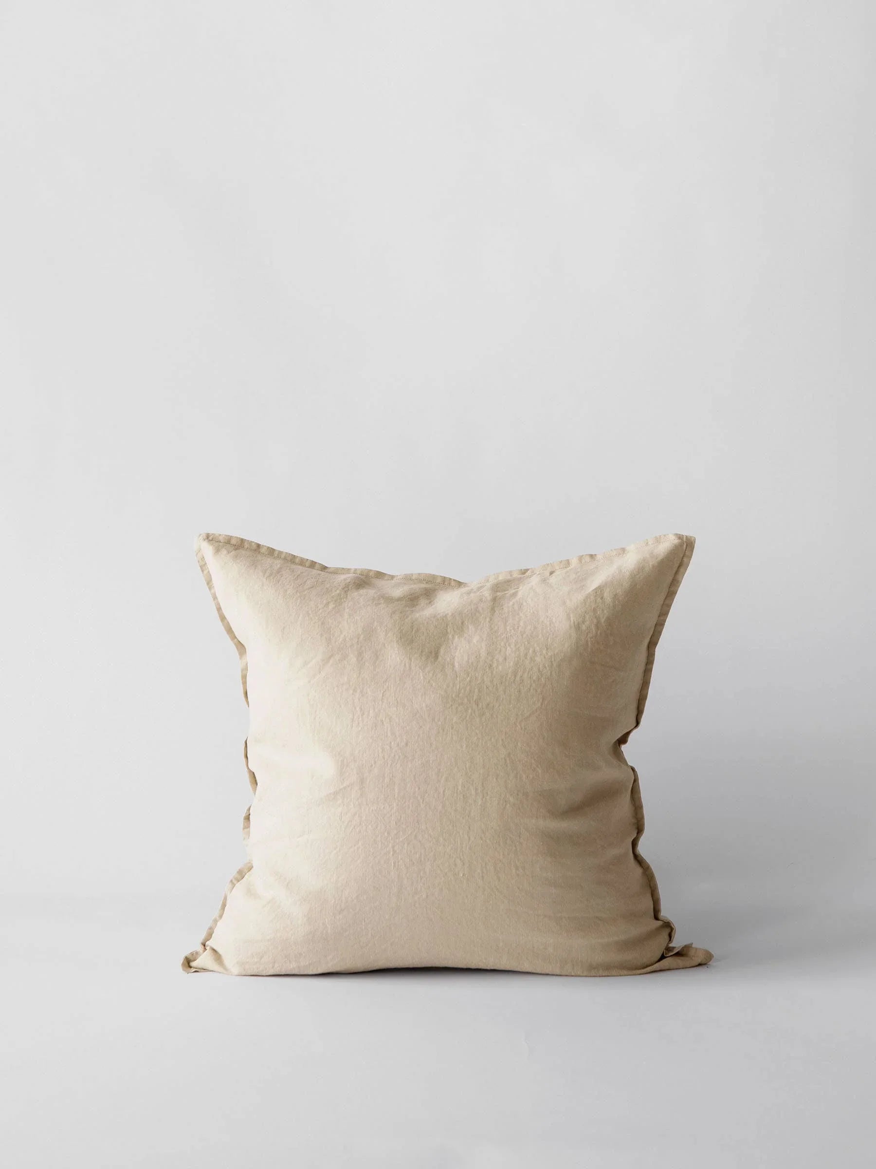 Aura Home linen cushion in natural beige, premium square pillow on plain background