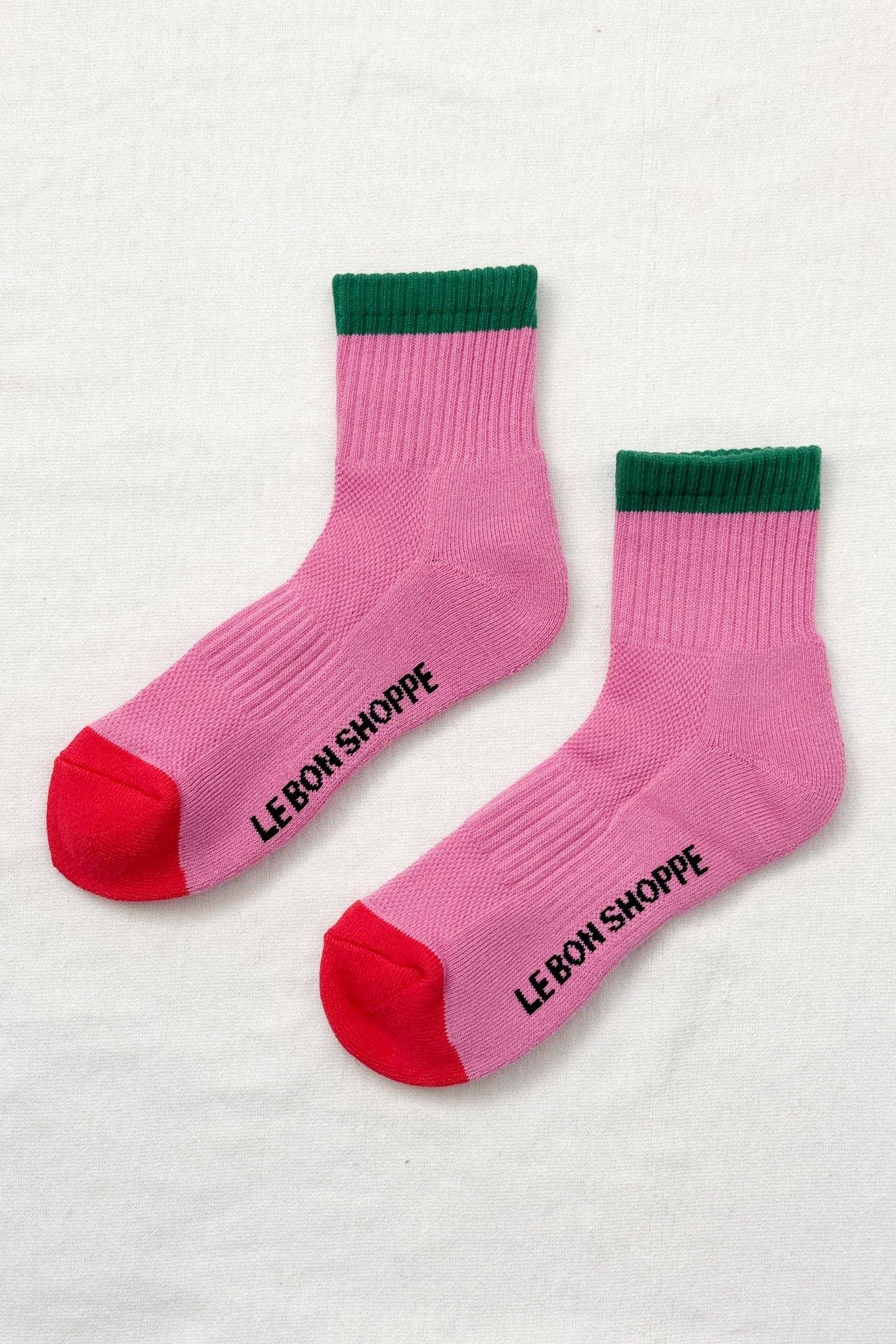 Le Bon Shoppe pink cotton crew socks with green cuffs and red toes on neutral background