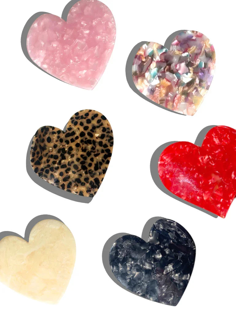 Chunks resin heart-shaped coasters set in pink, multicolor, leopard, red, cream, and black