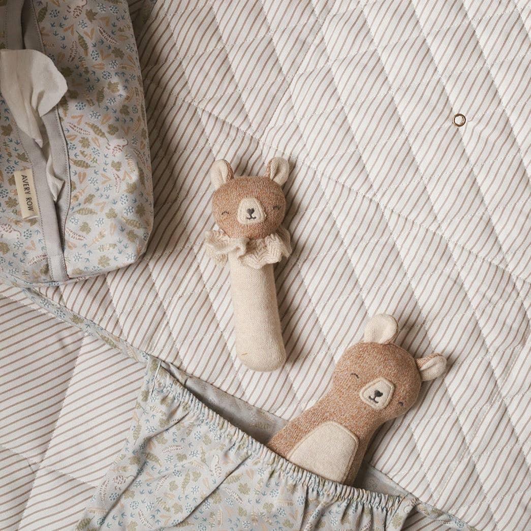 Avery Row soft bear rattles, organic cotton, beige and cream, on quilted baby mat with floral bag