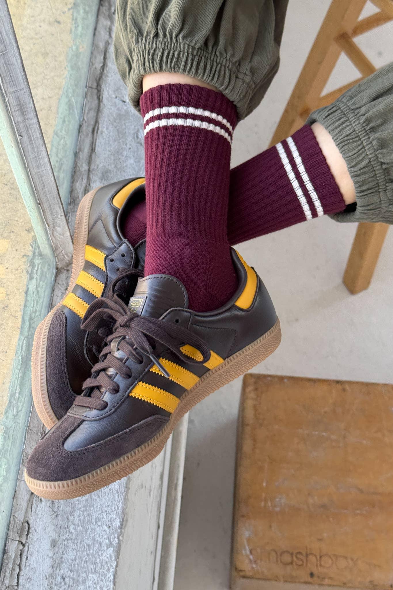 Adidas Samba OG brown yellow leather sneakers, gum soles, worn with burgundy striped socks