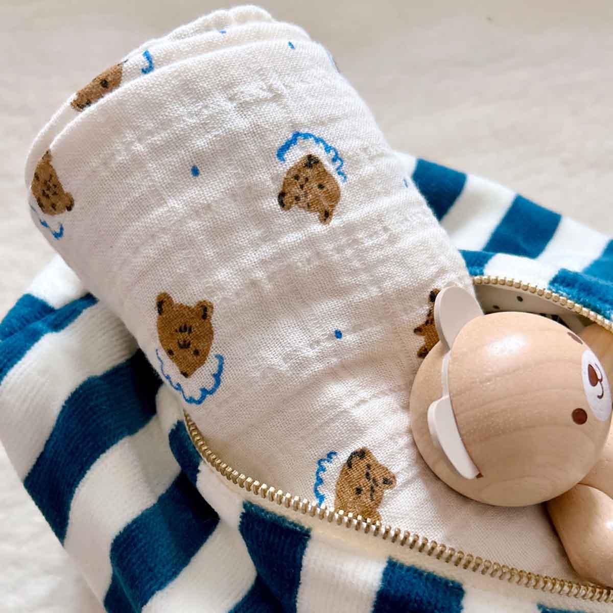 eLfinFolk baby muslin swaddle with bear print, wooden bear rattle, blue striped zipper pouch