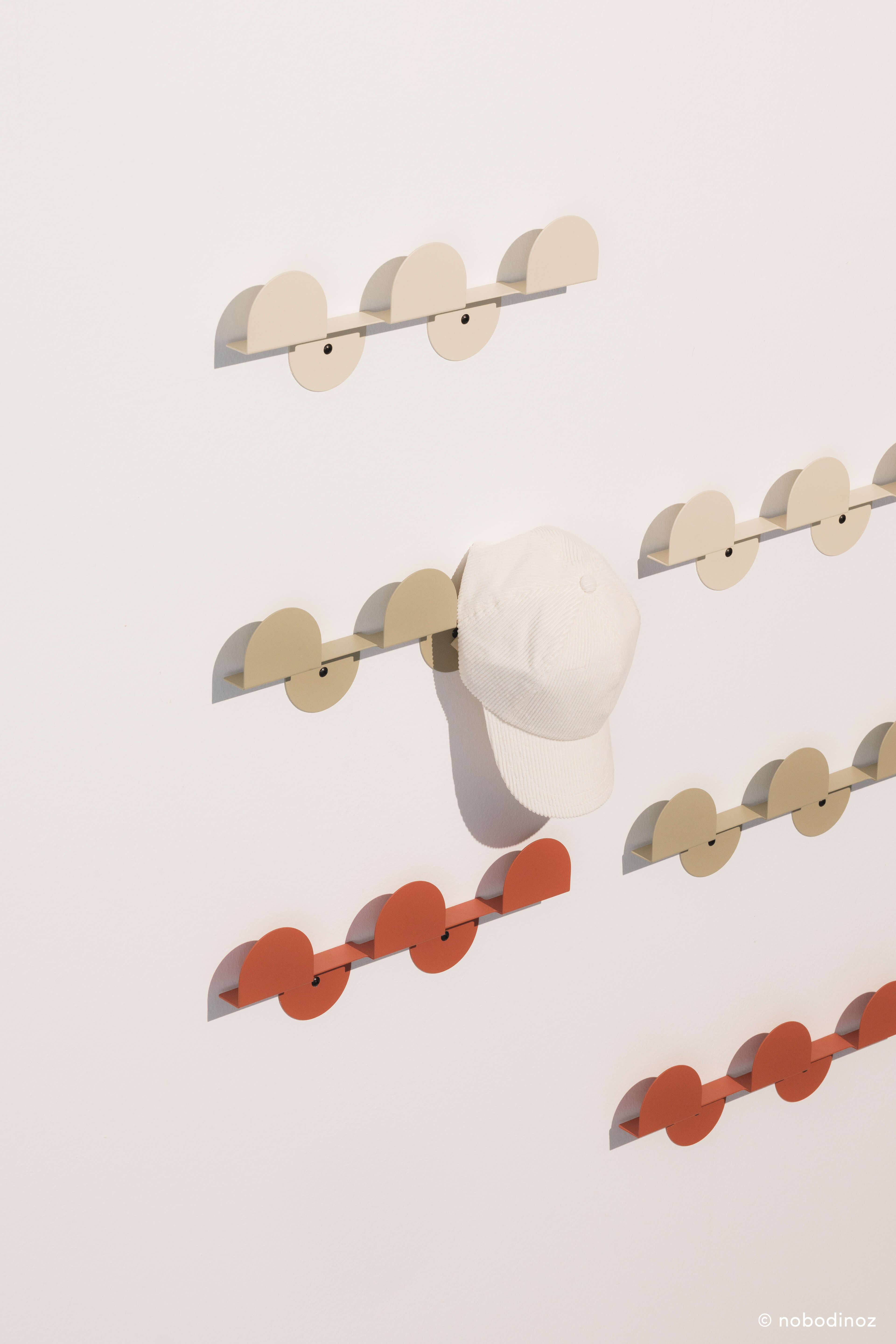 Lacquered steel wall coat rack