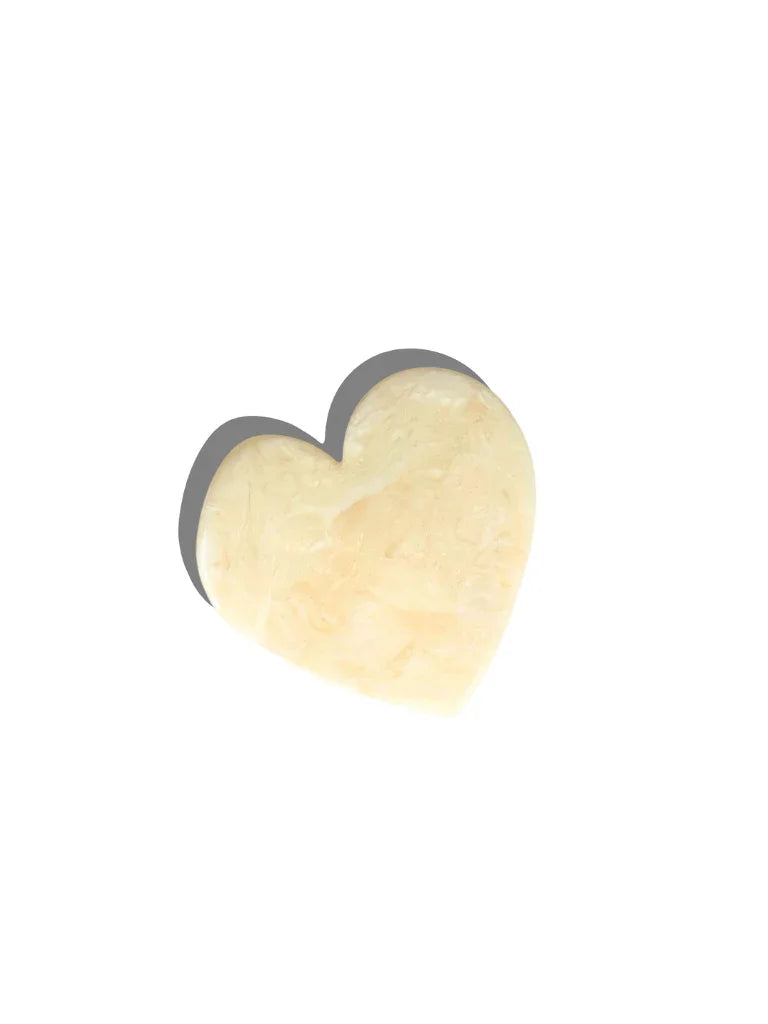 Urth Yarns heart-shaped, cream soap bar, natural ingredients on white background