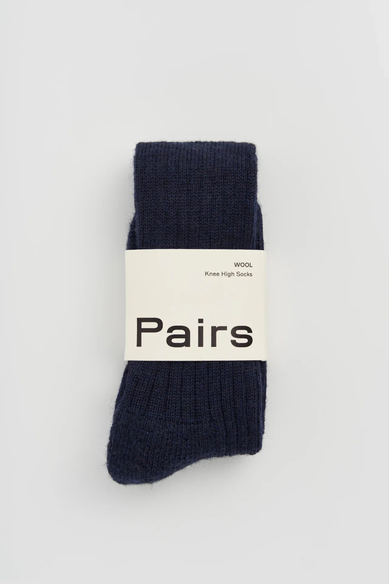 Pairs navy blue wool knee high socks, premium packaging, minimalist design