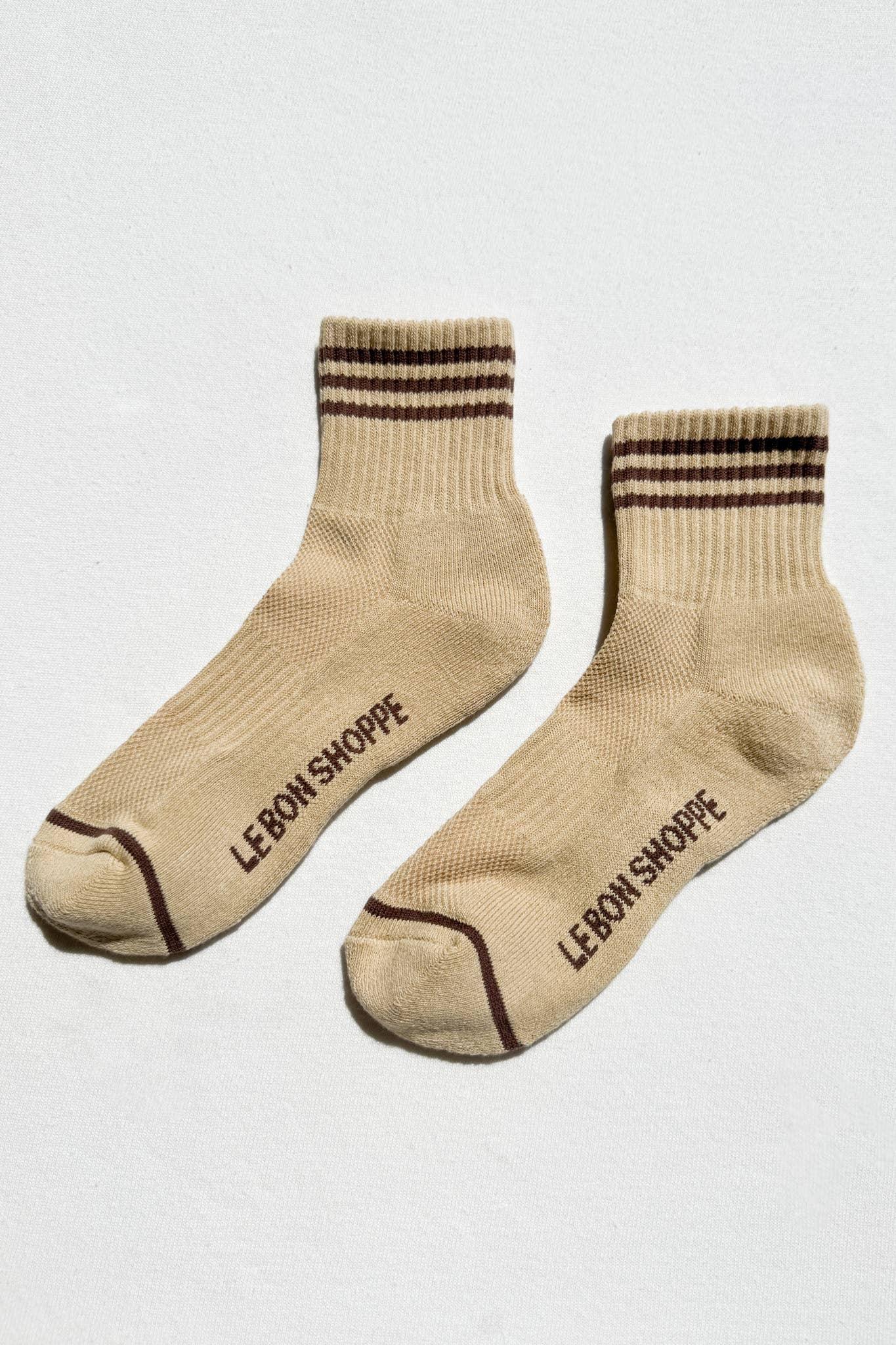 Le Bon Shoppe beige cotton socks with brown stripes and logo on white background