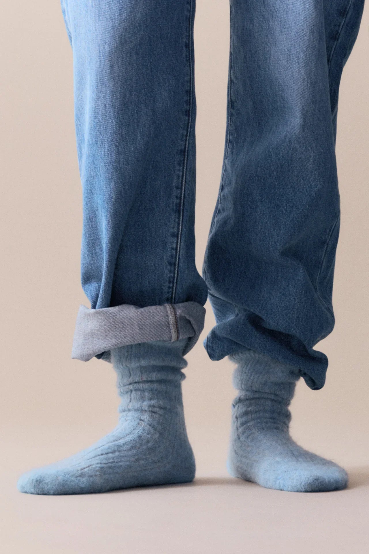 Le Bon Shoppe cozy mohair wool socks in light blue, styled with rolled denim jeans