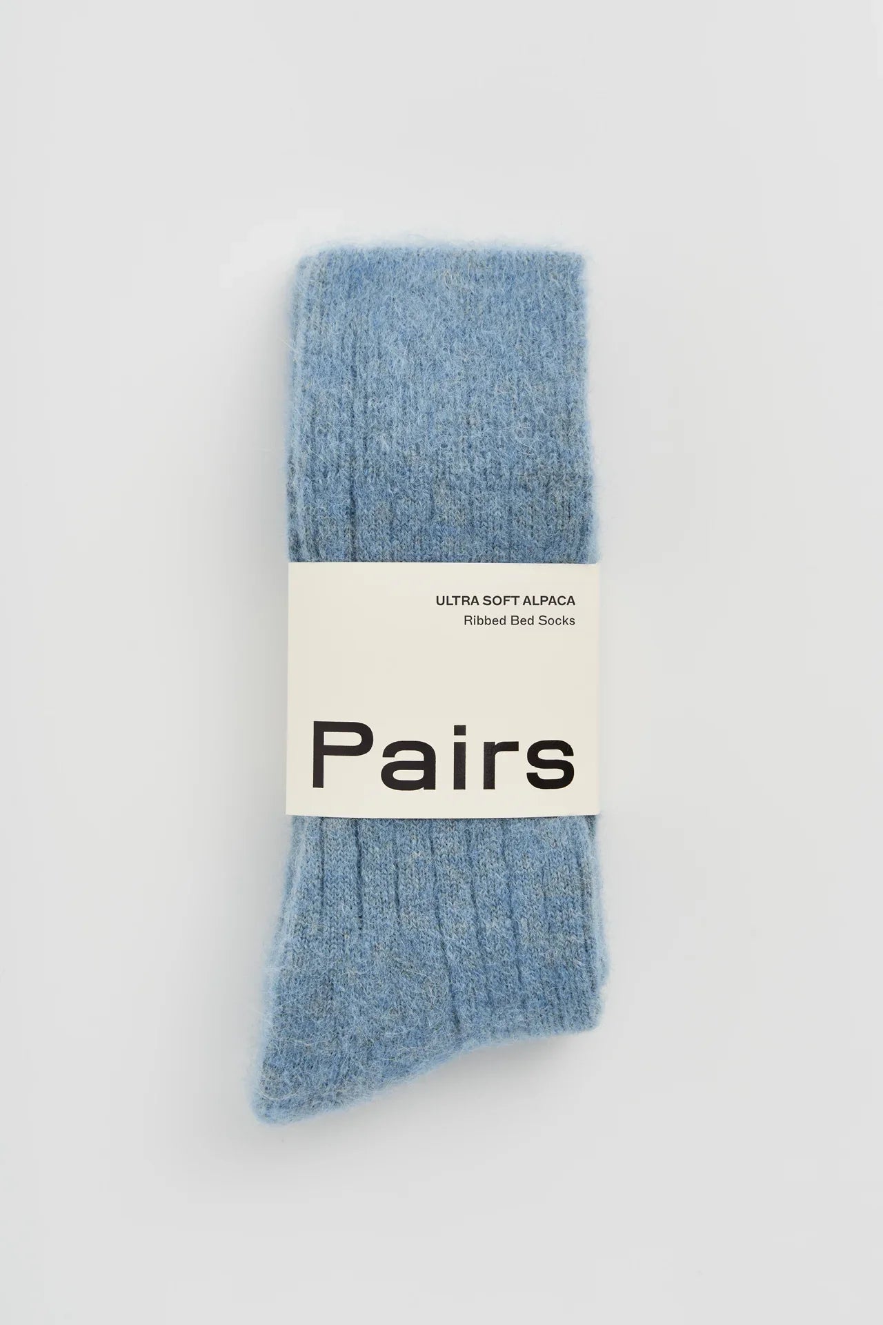Pairs ultra soft alpaca ribbed bed socks in light blue, premium cozy winter wear.